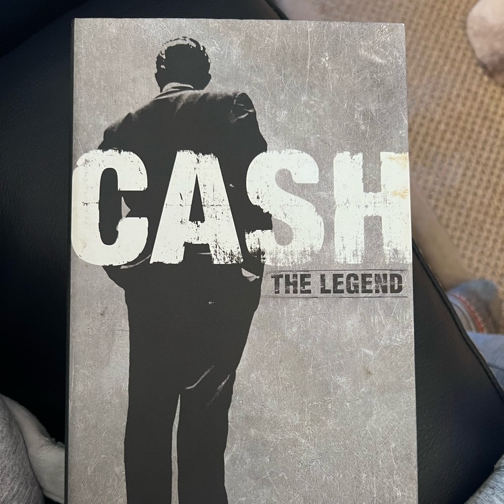 Johnny Cash 4 Disc Collector’s Set. Contains book about life and times.